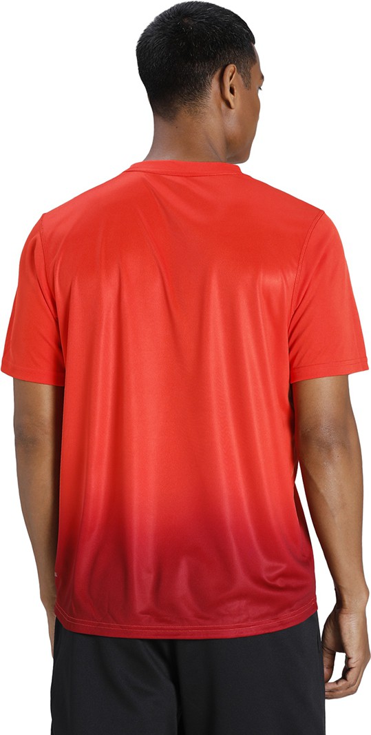PUMA Fade AOP Tee Grenadine. 