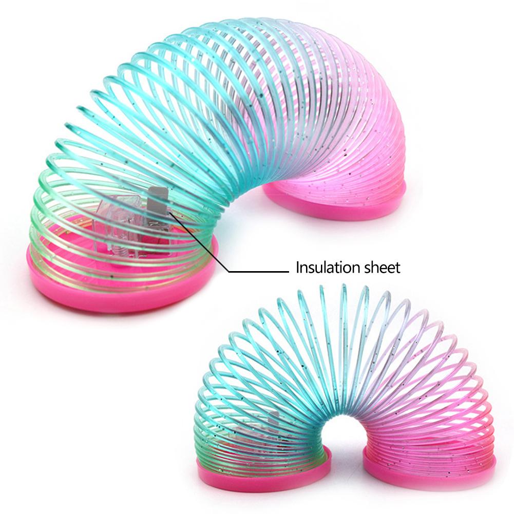 SF 1Pc Glow in Dark Walking Rainbow Spring Toy Circle Slinky Kid Magic Luminous Slinky Rainbow Spring Magic Circle Stretchy #432190. 
