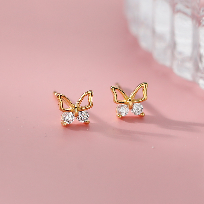 Butterfly Stud Earrings Women's New Niche Design Earrings in Autumn and Winter Simple Temperament Hollow Diamond Small Butterfly Earrings. 