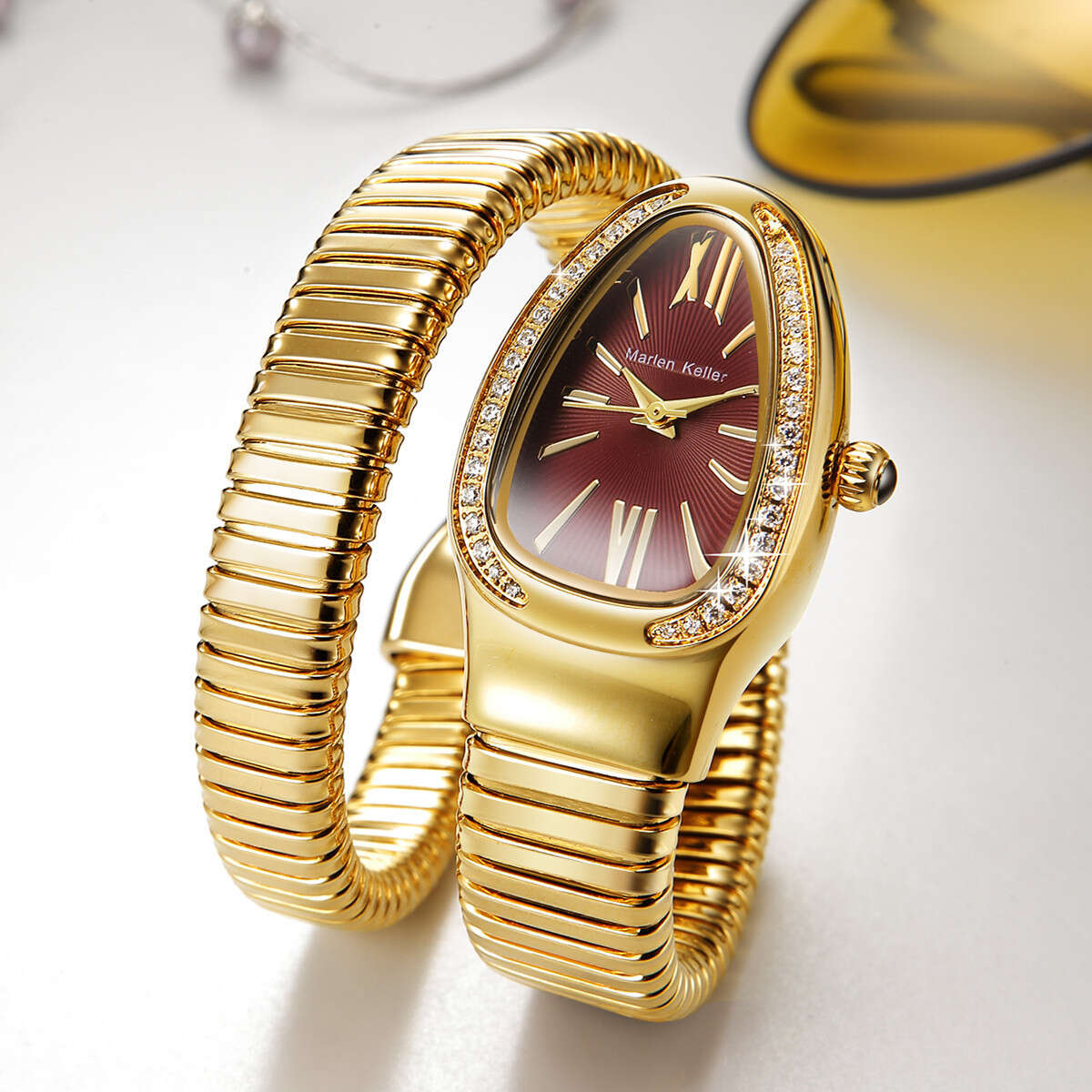 Marlene Keller (One and a Half Circles) New IP Electroplated English Inlaid Women's Snake Watch. 