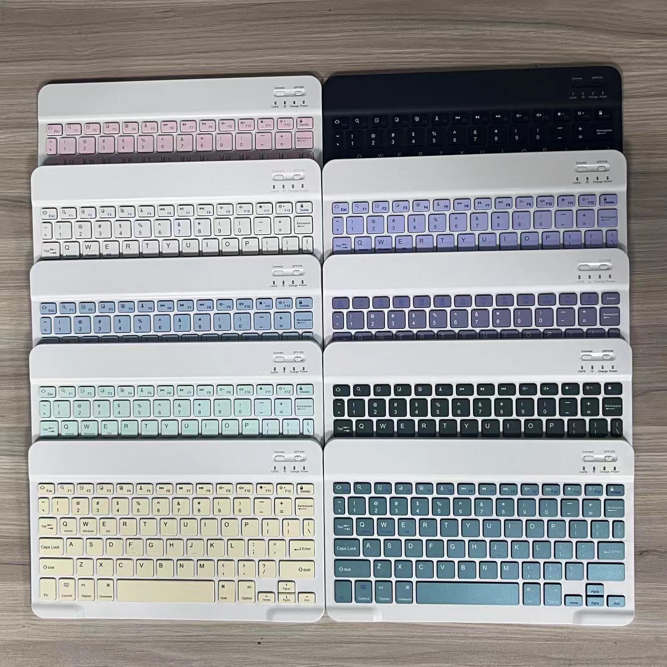 Factory wholesale bluetooth keyboard, android mobile phone tablet, portable, luminous touch keyboard, color bluetooth keyboard, mouse. 