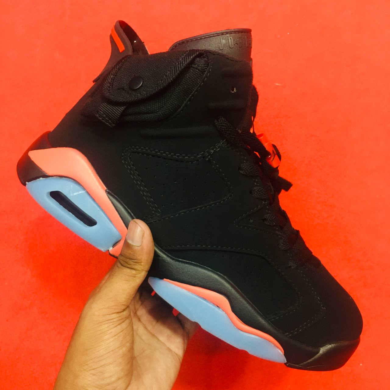 Black and orange jordan 6 best sale