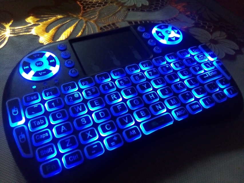 I8-B Backlit Mini Keyboard With Touchpad Mouse - Enjoy Wireless Convenience With Rechargeable Backlit Keyboard - Perfect For Gaming And Office Use. 