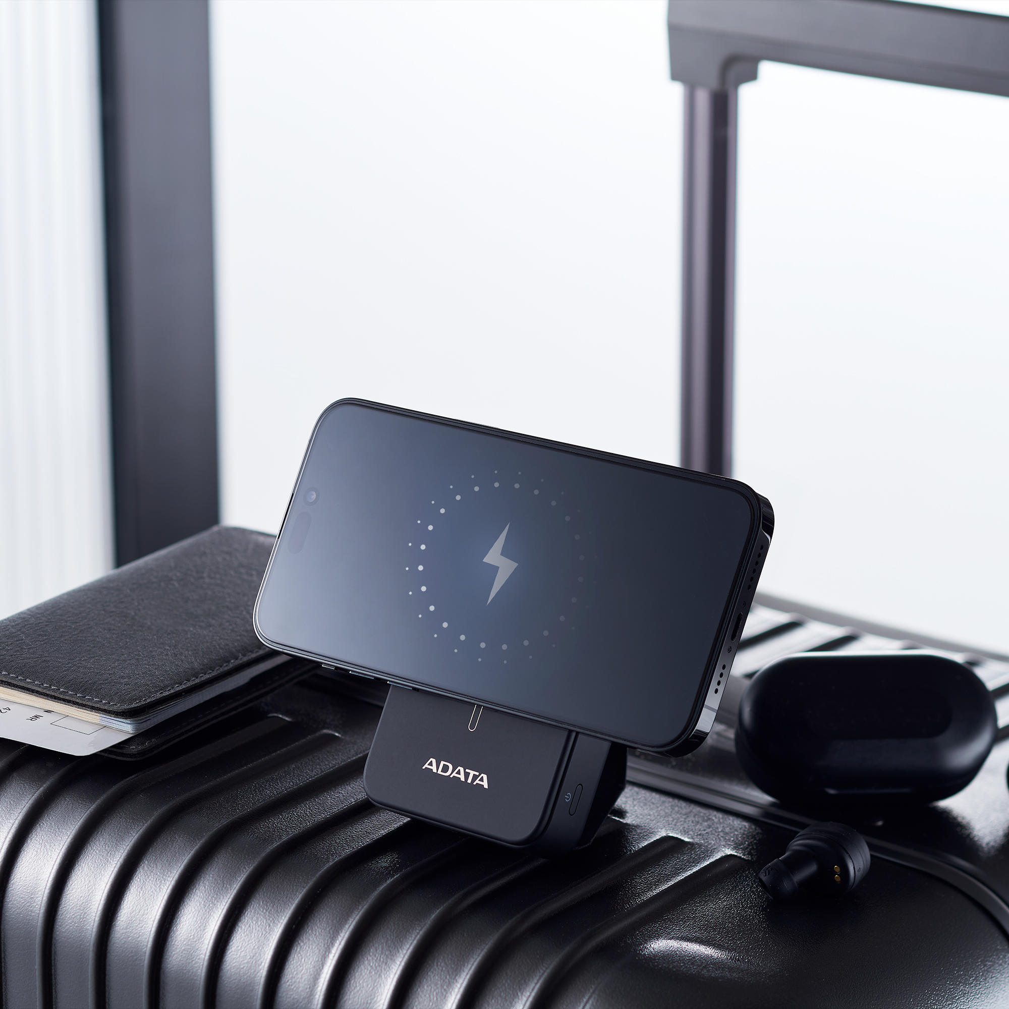 ADATA R100 10000mAh Magnetic Power Bank - Portable magnetic wireless charging - QC/PD 20W fast charging - Simultaneous 3-device charging - Multiple circuit protection mechanisms - Integrated foldable stand designed into back plate. 