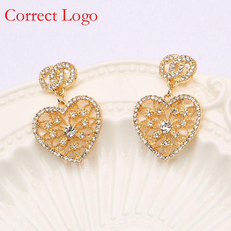 Orecchini a forma di cuore vuoti per donna, eleganti orecchini di tendenza ispirati a Chanel con doppia C di alta qualità coreana, semplici e_voghion.com