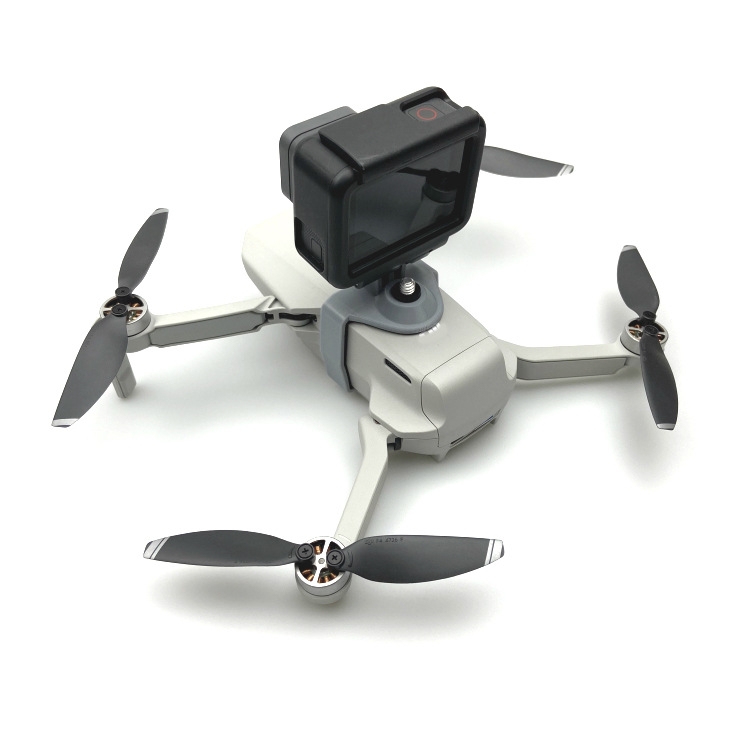 The DJI Mavic Mini 2 is a 1/4 action camera Action2GoPro. 